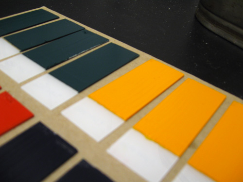 Green and gold paint swatches